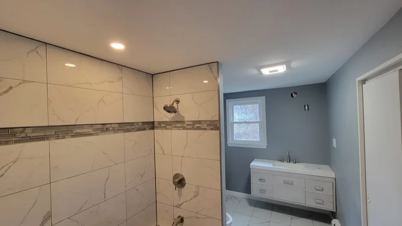 Recessed lighting installed in a bathroom remodel