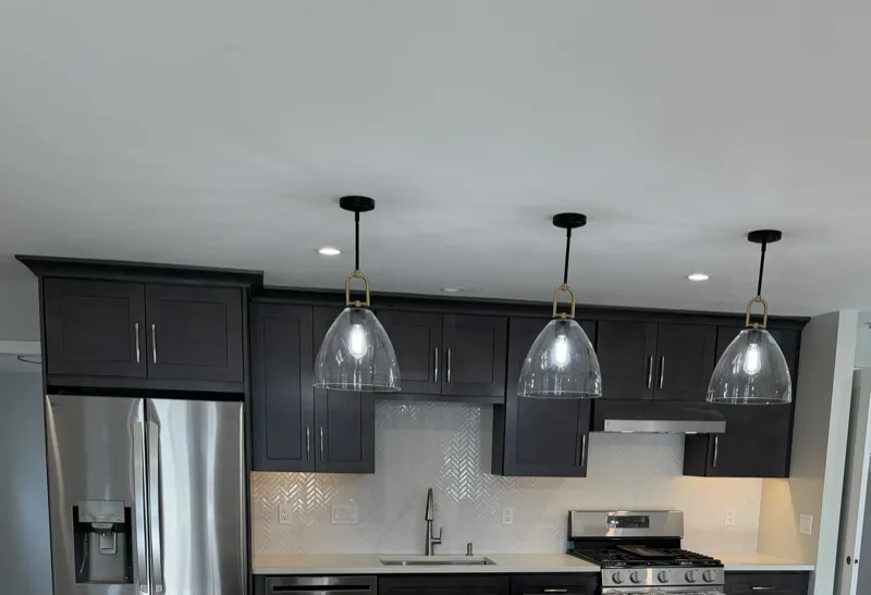 Pendant lighting installed above a kitchen island